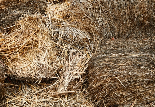 Some people do DIY RV skirting for winter using hay bales