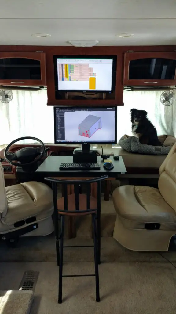 RVing full time jobs require office flexibility. Office set up in front of a Class A RV