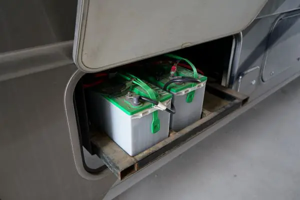The RV generator charges the batteries