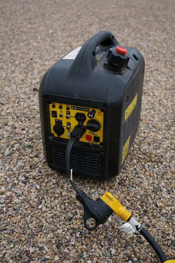 portable RV generators may need a 30 to 15 amp dogbone adapter like the one pictured here. 