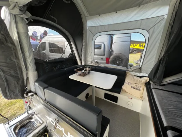 Weight of pop up campers is increased with more amenities like this dinette